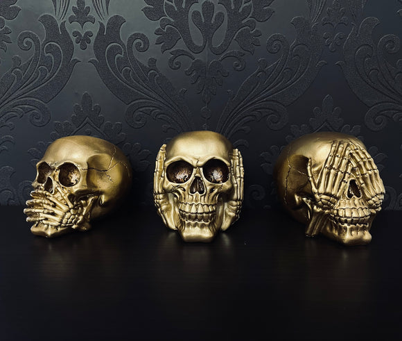 Gold skull decoration trio